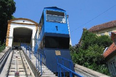 Zagreb, 1. July 2004.  In operation since 1893. Length of track 66 meter, height difference 30,5 meter which makes an inclination at 52%.Until 1934 the funicular was driven by steam engines.